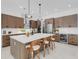 Gourmet kitchen featuring a large island, modern appliances, and ample cabinet space at 2182 Wisteria St, Sarasota, FL 34239