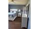 Bedroom featuring nice wood floors, a ceiling fan, and white bedroom furniture at 2218 Orange Blossom Ln # 0, Bradenton, FL 34207