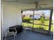 Cozy screened lanai with white chairs offering views of the well-maintained backyard at 2218 Orange Blossom Ln # 0, Bradenton, FL 34207