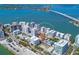 A stunning aerial view of the condo community, perfectly situated on the water with easy access to the bay at 226 Golden Gate Pt # 63, Sarasota, FL 34236