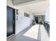 Spacious outdoor balcony with seating area offering residents outdoor space at 226 Golden Gate Pt # 63, Sarasota, FL 34236