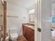 Bathroom features granite countertops, a custom vanity, and tile floors at 226 Golden Gate Pt # 63, Sarasota, FL 34236