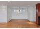 Light and bright dining room features hardwood floors and recessed lighting at 226 Golden Gate Pt # 63, Sarasota, FL 34236