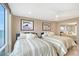 Comfortable bedroom with two beds, a ceiling fan, and sliding mirrored closet doors at 2425 Gulf Of Mexico Dr # 6A, Longboat Key, FL 34228