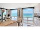 Kitchen featuring white cabinets and countertops, with a stunning view of the ocean at 2425 Gulf Of Mexico Dr # 6A, Longboat Key, FL 34228