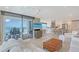 Combined living area with tile floor and balcony overlooking the ocean at 2425 Gulf Of Mexico Dr # 6A, Longboat Key, FL 34228