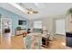 Bright living room featuring tiled floors, a skylight, and contemporary decor at 2522 51St Street E Ct, Palmetto, FL 34221
