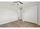 Bedroom with wood-look flooring and spacious closet at 2704 Gaspar Ave, North Port, FL 34288