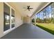 Spacious covered patio with ceiling fans and outdoor views at 2704 Gaspar Ave, North Port, FL 34288