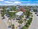 Aerial view of a neighborhood with houses surrounded by palm trees and landscaping at 302 And 304 Canal Rd, Sarasota, FL 34242