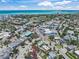 Beautiful aerial view of the town and surrounding waterway highlighting mature trees and colorful buildings at 302 And 304 Canal Rd, Sarasota, FL 34242