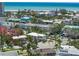 Charming neighborhood showcases colorful buildings with lush landscaping near the beach and gulf at 302 And 304 Canal Rd, Sarasota, FL 34242