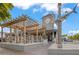 Pub exterior with outdoor seating, nautical theming, and an inviting atmosphere for casual dining at 302 And 304 Canal Rd, Sarasota, FL 34242