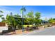 Restaurant's exterior with green landscaping and outdoor bench seating enhances the neighborhood feel at 302 And 304 Canal Rd, Sarasota, FL 34242