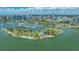 Aerial view of a waterfront park in downtown, surrounded by boats and the city skyline at 33 S Palm Ave # 1303, Sarasota, FL 34236