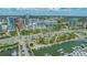 Expansive aerial view capturing the city skyline, marina, and surrounding waterfront of the property at 33 S Palm Ave # 1303, Sarasota, FL 34236