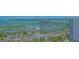 Overhead aerial of marina filled with boats and yachts, alongside a tropical shoreline at 33 S Palm Ave # 1303, Sarasota, FL 34236