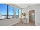 Bright bedroom with stunning city views from large windows and a shower at 33 S Palm Ave # 1303, Sarasota, FL 34236