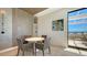 Cozy dining area with pendant lighting, modern decor, and access to outdoor seating at 33 S Palm Ave # 1303, Sarasota, FL 34236
