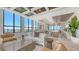 Spacious living room featuring floor-to-ceiling windows with beautiful views of the city skyline at 33 S Palm Ave # 1303, Sarasota, FL 34236