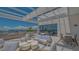 Expansive terrace with outdoor kitchen and ample seating, offering panoramic city and water views at 33 S Palm Ave # 1303, Sarasota, FL 34236