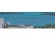 Stunning water view showcasing the calm, blue ocean with boats sailing on a sunny day at 33 S Palm Ave # 1303, Sarasota, FL 34236