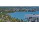 Expansive waterfront view featuring lush greenery and luxury homes in a beautiful coastal setting at 33 S Palm Ave # 1303, Sarasota, FL 34236