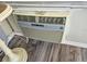 Close up of a window unit, air conditioning unit, that is located inside the home at 3318 Oakwood S Blvd, Sarasota, FL 34237
