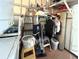 Functional utility room equipped with a washer, dryer, and plenty of storage at 3318 Oakwood S Blvd, Sarasota, FL 34237