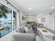 Inviting living room offers water views, ample seating, and a serene ambiance for coastal living at 3320 Gulf Of Mexico Dr # 208C, Longboat Key, FL 34228
