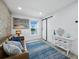 Comfortable living room featuring a coastal design, wood accents, and waterfront view at 3320 Gulf Of Mexico Dr # 208C, Longboat Key, FL 34228