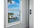 Window view of waterfront and boat docks at 3320 Gulf Of Mexico Dr # 208C, Longboat Key, FL 34228