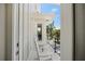 Covered balcony with white rocking chairs offers a quiet outdoor space at 340 Avenida De Mayo, Sarasota, FL 34242