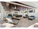 Expansive outdoor living area featuring lounge chairs, seating, and a wet bar at 340 Avenida De Mayo, Sarasota, FL 34242