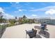 Spacious rooftop deck boasts neighborhood views and seating, perfect for entertaining at 340 Avenida De Mayo, Sarasota, FL 34242