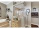 Elegant bathroom with a glass-enclosed shower, soaking tub, and stylish decor for a spa-like experience at 385 165Th Ne Ct, Bradenton, FL 34212