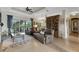 Spacious living room flows to the kitchen and dining area, creating an open and airy feel at 385 165Th Ne Ct, Bradenton, FL 34212