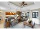 Spacious living room flows to the kitchen and dining area, creating an open and airy feel at 385 165Th Ne Ct, Bradenton, FL 34212