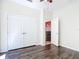 Bedroom features a ceiling fan and a closet at 4239 Corso Venetia Blvd, Venice, FL 34293