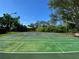 Enjoy community sports with this basketball and shuffleboard court, surrounded by natural landscaping at 4239 Corso Venetia Blvd, Venice, FL 34293