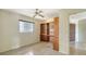 Bedroom features tile floor, ceiling fan and built-in closet storage at 4361 Pompano Ln, Palmetto, FL 34221