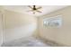 Bedroom features ceiling fan, window and closet at 4361 Pompano Ln, Palmetto, FL 34221