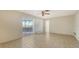 The dining area has tile floors and sliding glass doors with views of the pool and water at 4361 Pompano Ln, Palmetto, FL 34221