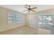 Open dining area with tile floors, sliding glass doors to the pool, and modern window shutters at 4361 Pompano Ln, Palmetto, FL 34221