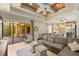 Open living area with seamless transition to the outdoor space, providing ample seating and natural light at 4584 Tuscana Dr, Sarasota, FL 34241