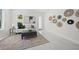 Bright, cozy living room features marble floors, modern decor, and plenty of natural light at 4726 Rivetta Ct, Sarasota, FL 34231