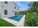 Stunning pool area with modern landscaping, complementing the sleek design of the home at 4726 Rivetta Ct, Sarasota, FL 34231