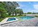 Beautiful backyard with a refreshing pool and spa, perfect for relaxation and outdoor enjoyment at 4726 Rivetta Ct, Sarasota, FL 34231