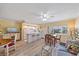 Spacious living area with an open floor plan, seamlessly connecting the kitchen, dining area, and living space at 475 Benjamin Franklin Dr # 211, Sarasota, FL 34236