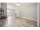 Open bonus room with lake views, neutral color palette, and ample space for relaxation or recreation at 5091 Creekside Trl, Sarasota, FL 34243